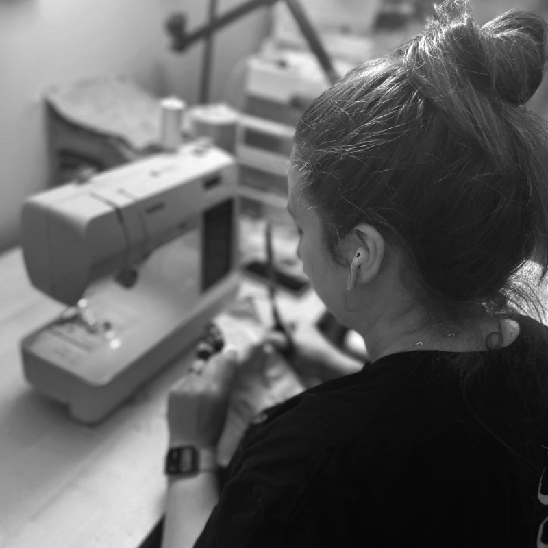 Grace working on a sewing project